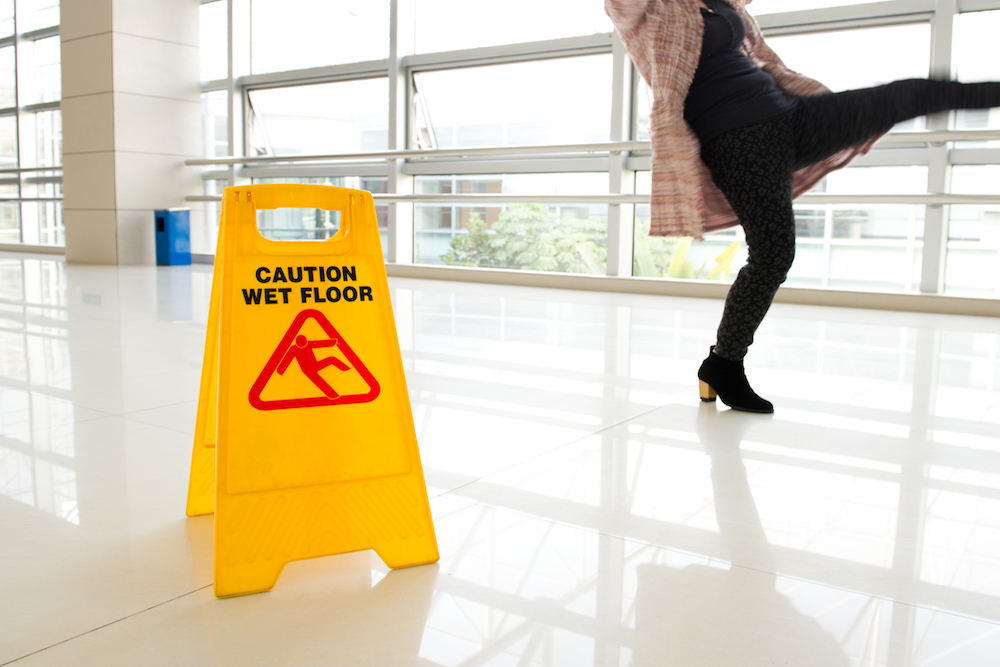 woman slipping on wet flood Santa Monica CA